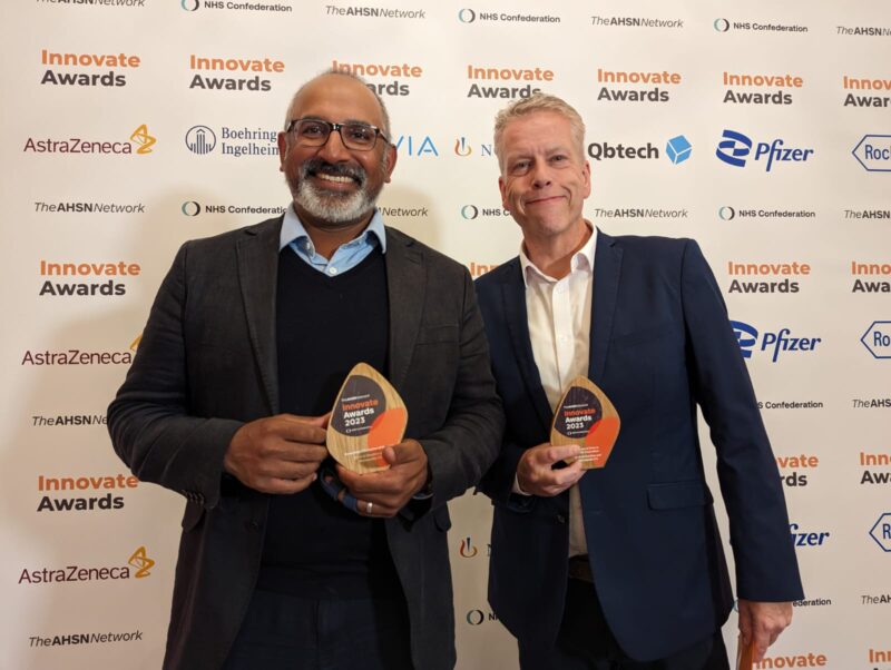 Steve Barnett and Mark Ratnarajah from C2-AI picking up their Innovate Awards
